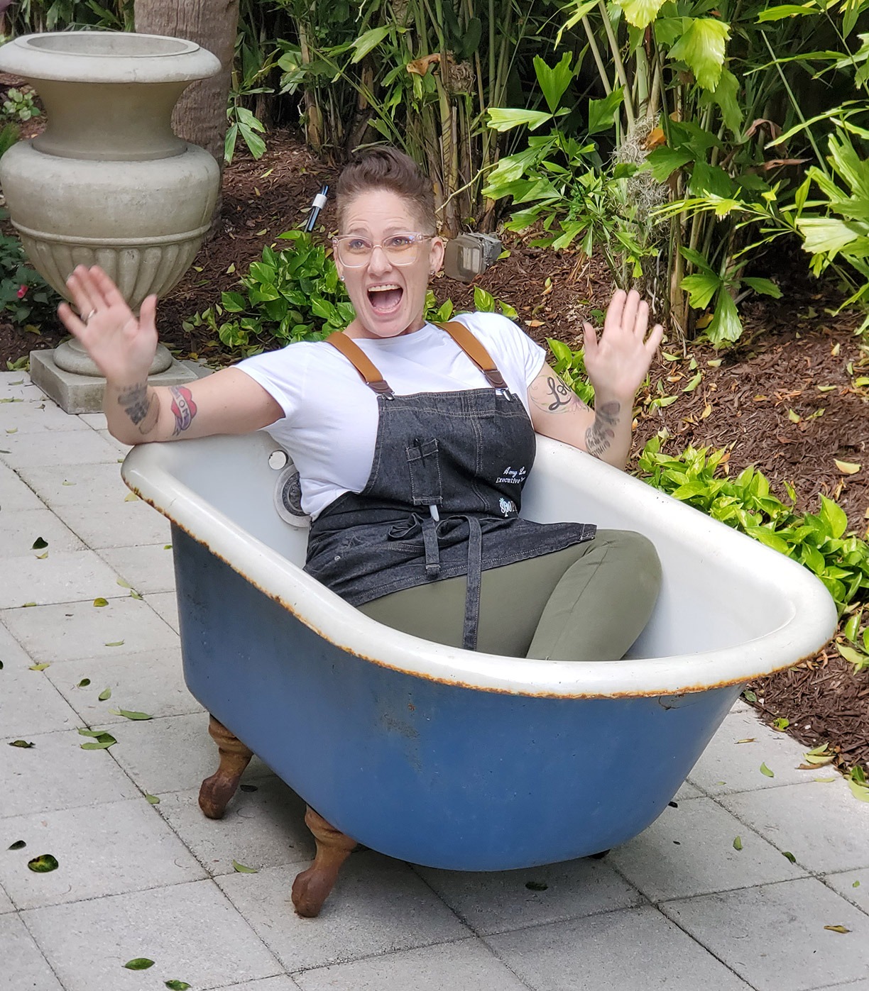 A girl in a small bath tub